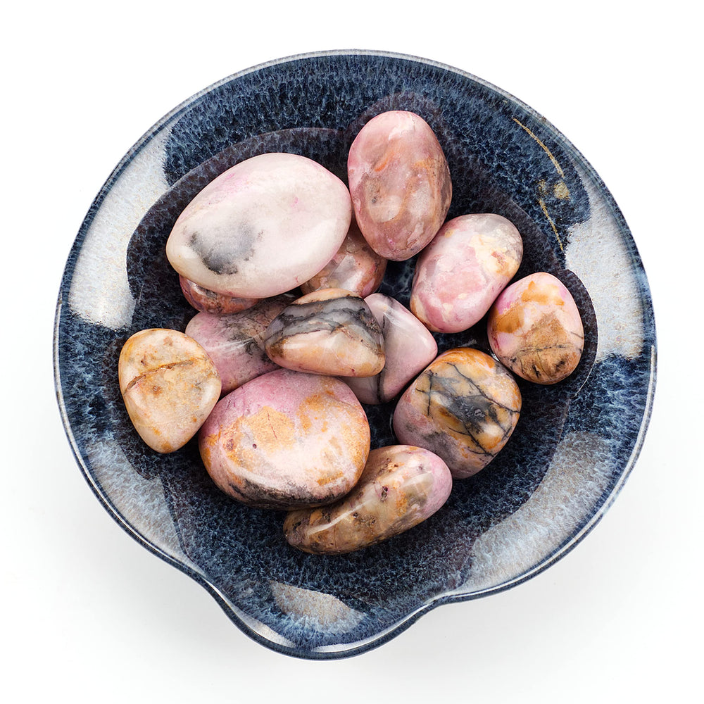 Cherry Tree Collection Rhodonite tumbled crystals showcase pink hues for emotional balance.