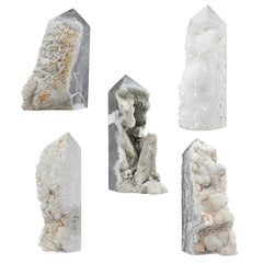 Cheungshing natural quartz point texture detail emphasizes unique crystal patterns for display.