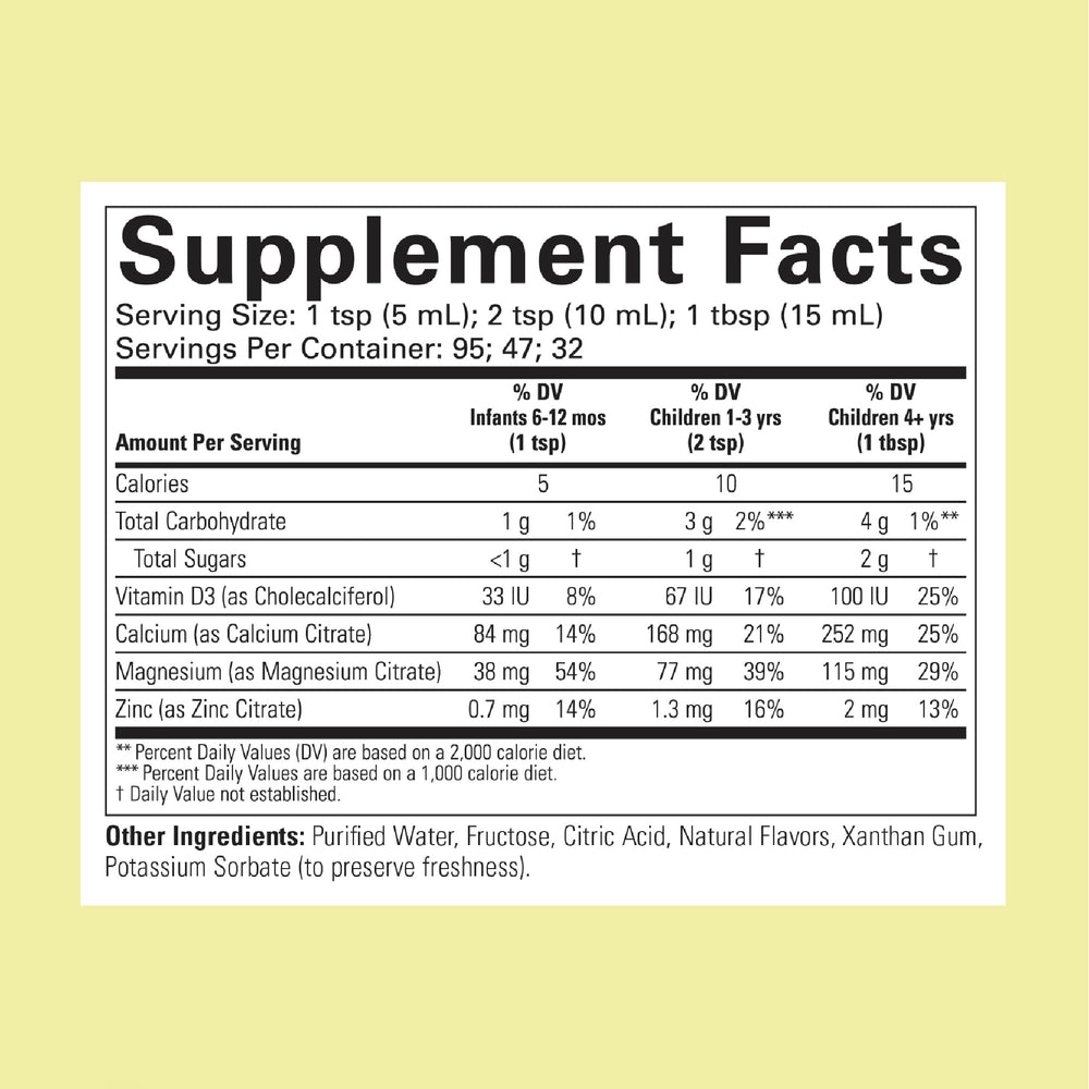 Dosing spoon showing easy daily calcium servings for kids.