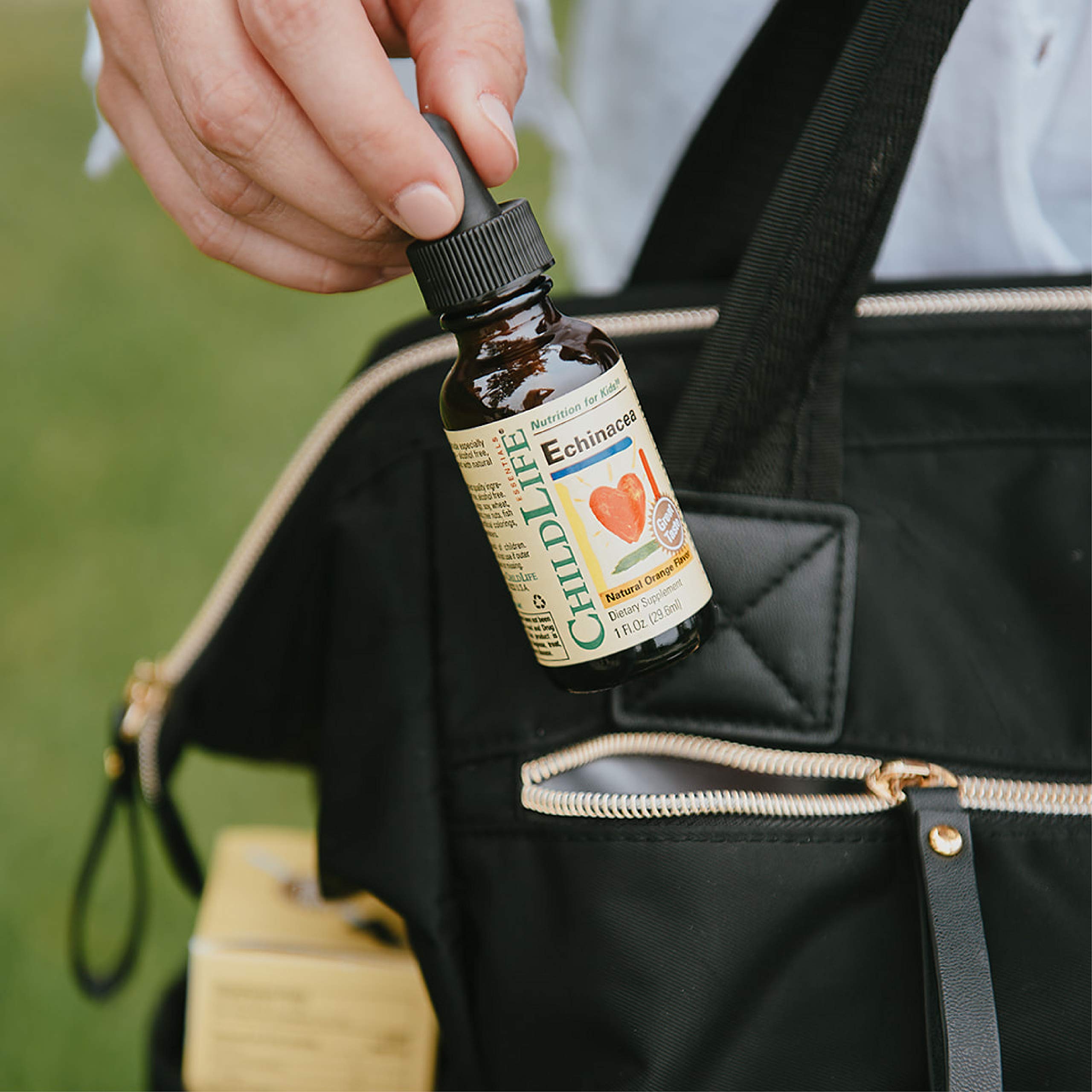 Dosing dropper shown for accurate servings of Child Life Essentials echinacea.