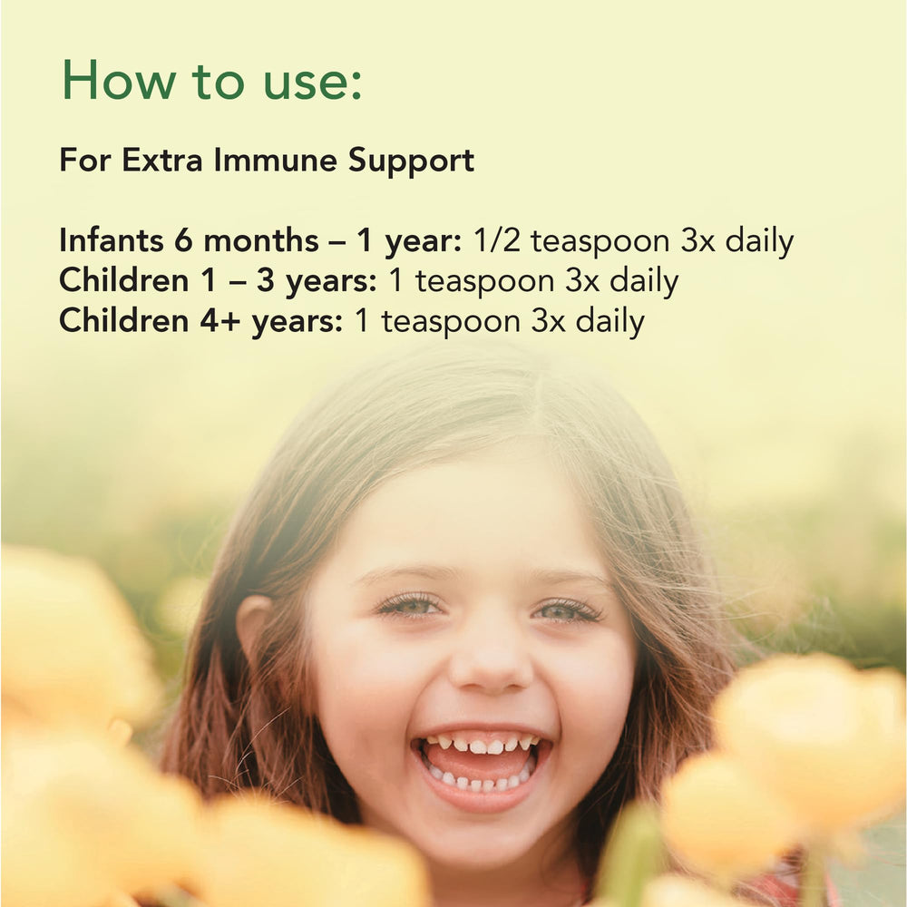 CHILDLIFE ESSENTIALS First Defense kid using syrup with measuring cup for practical use