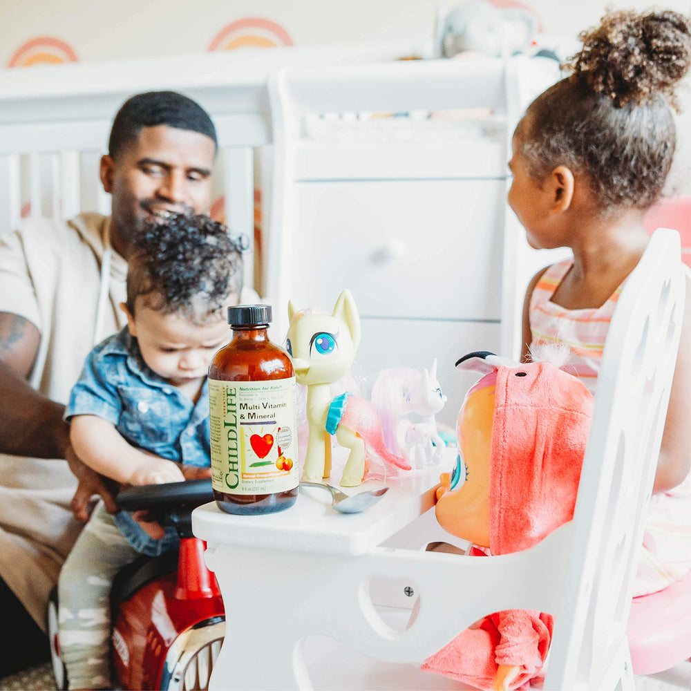 CHILDLIFE ESSENTIALS Kids Multivitamin dosing guide provides clear administration tips.