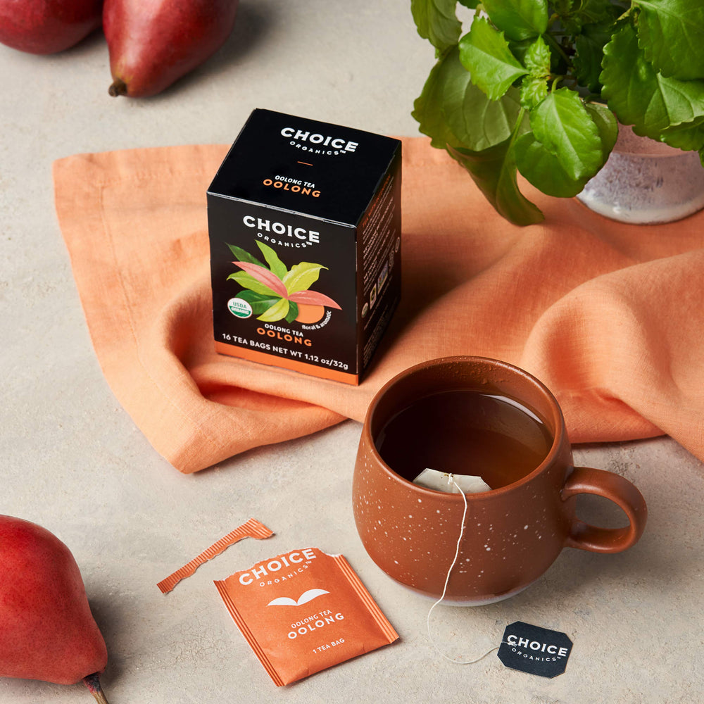 Choice Organics Oolong tea packaging highlights compostable bags and recycled cartons.