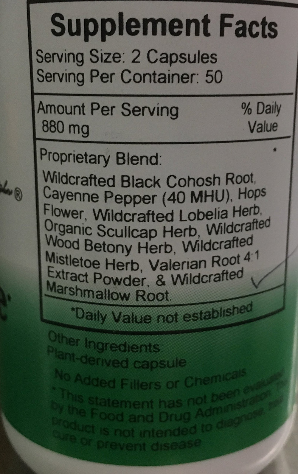 Relax-Eze capsule close-up showing veggie capsules and natural herbal blend.