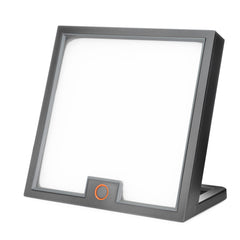 Circadian Optics Lumine desk lamp on a clean workspace for bright, mood-boosting light