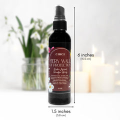 Circe Fiery Wall of Protection spray label closeup highlights frankincense, myrrh, and ginger blend.