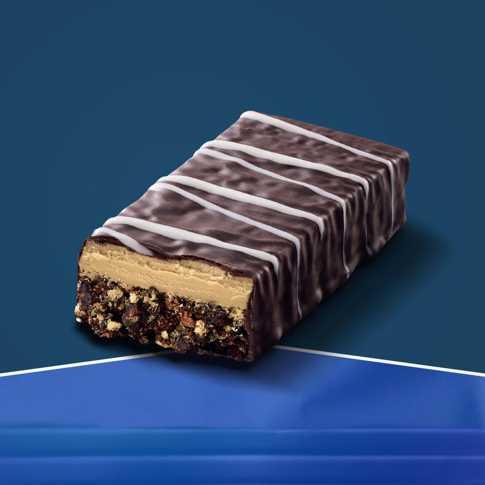 CLIF BUILDERS Oreo bar beside water, ideal for post-workout hydration