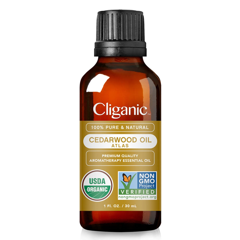 Cliganic Cedarwood oil packaging variation on shelf.