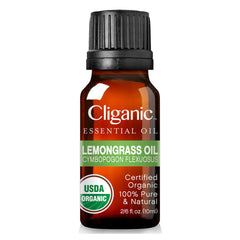 Cliganic Lemongrass essential oil bottle on desk beside aromatic diffuser