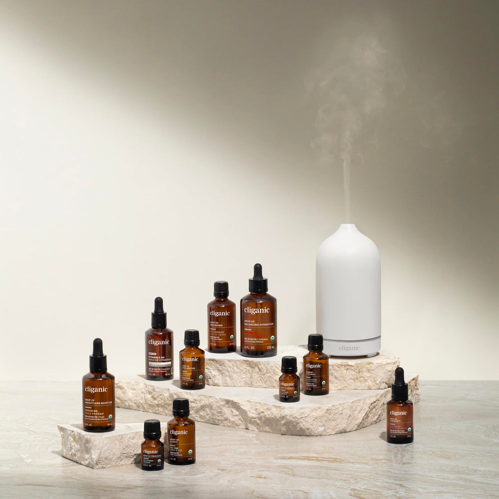 Cliganic Organic Lavender Essential Oil bottle with label variation showing packaging options.