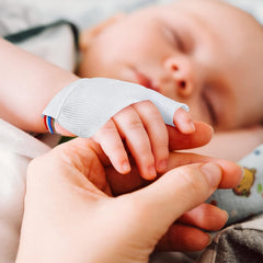 Cloverhome Thumb Sucking Guard worn during play demonstrates unrestricted activities.