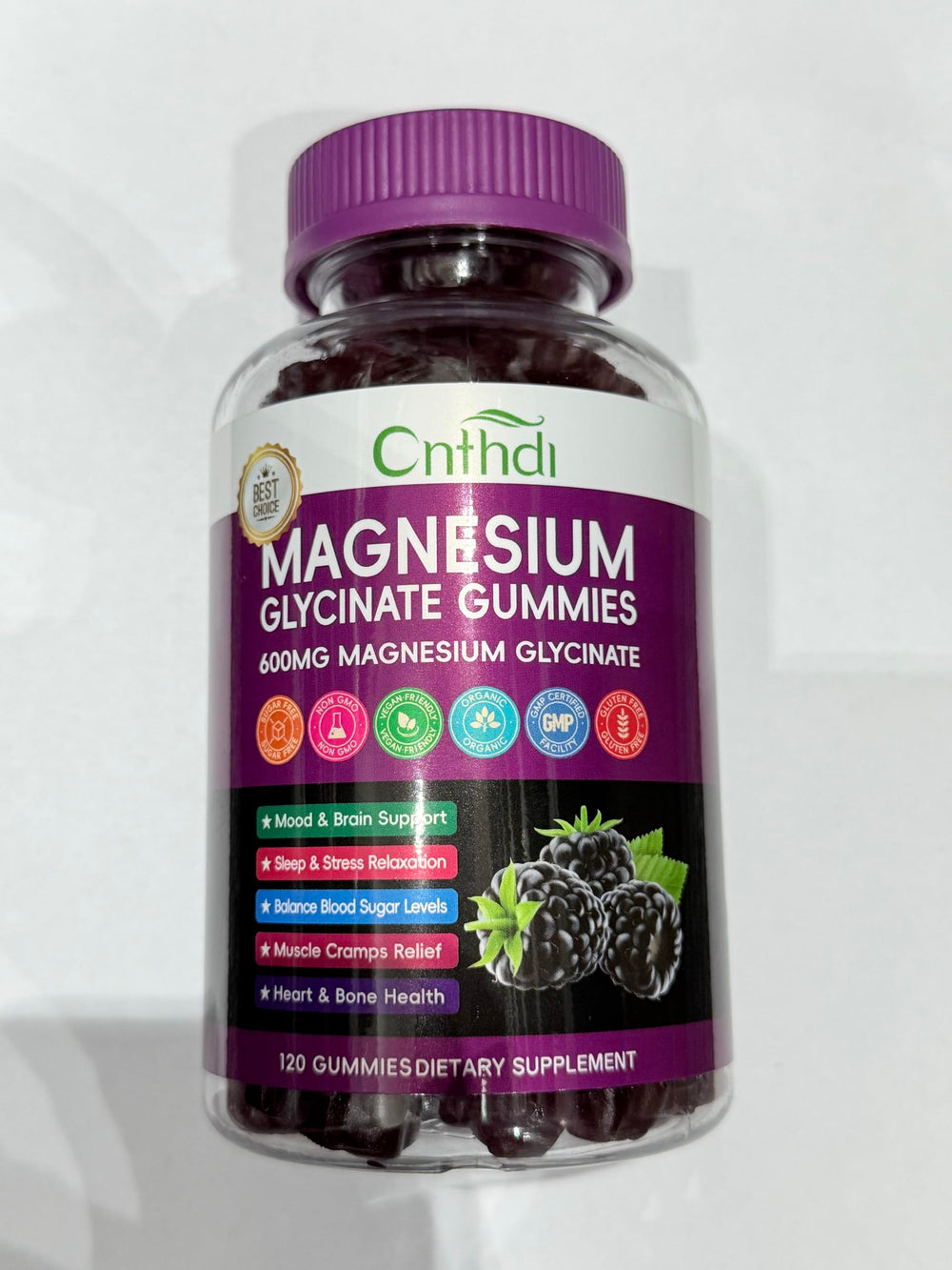 Close-up of blackberry flavored gummies emphasizing sugar-free daily supplement use.