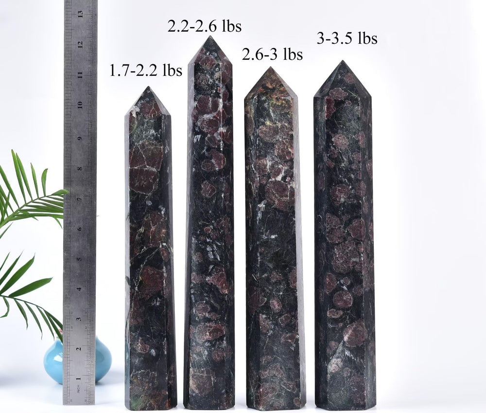 CNYANFEI garnet wand on altar conveying balance and focus.