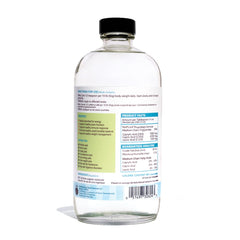 CocoTherapy Triplex MCT-3 Oil label closeup highlighting pure and natural ingredients.