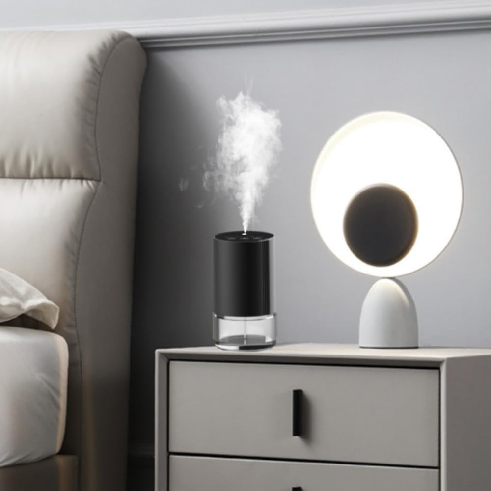 Cocoarm touch-control diffuser shown in action for easy mist customization.
