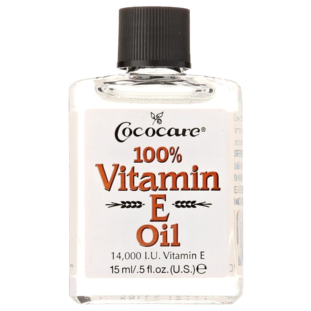 COCOCARE Vitamin E Oil bottle showing antioxidant protection for skin