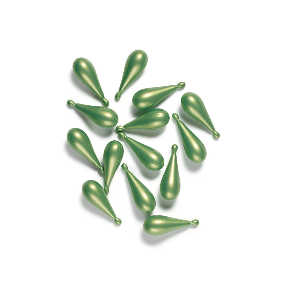 Close-up of Collistar Pure Actives capsules highlighting caffeine-rich formula.