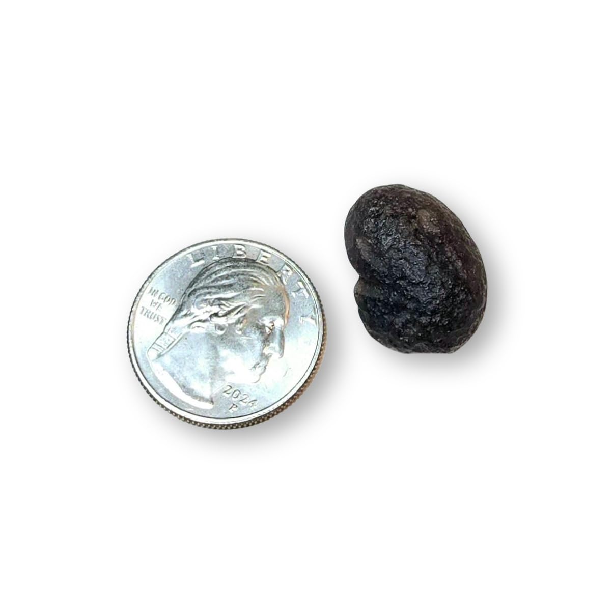 Colombianite Stone of Lightning held to light reveals inner glow for clarity and calm