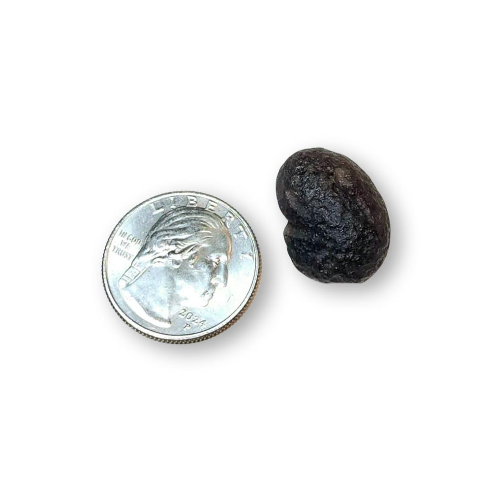 Colombianite Stone of Lightning held to light reveals inner glow for clarity and calm