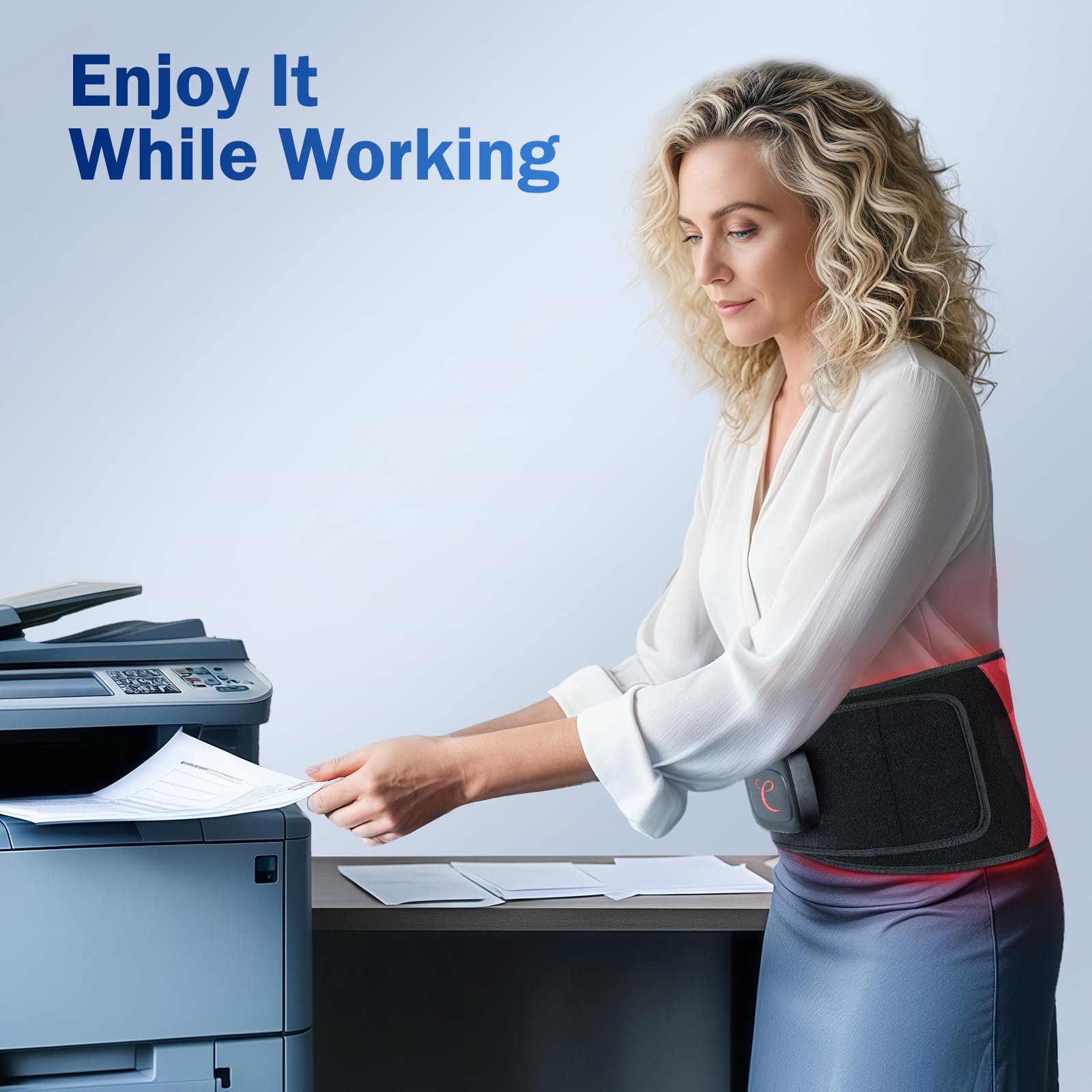 Comfytemp red light belt in office setting highlights hands-free relaxation.