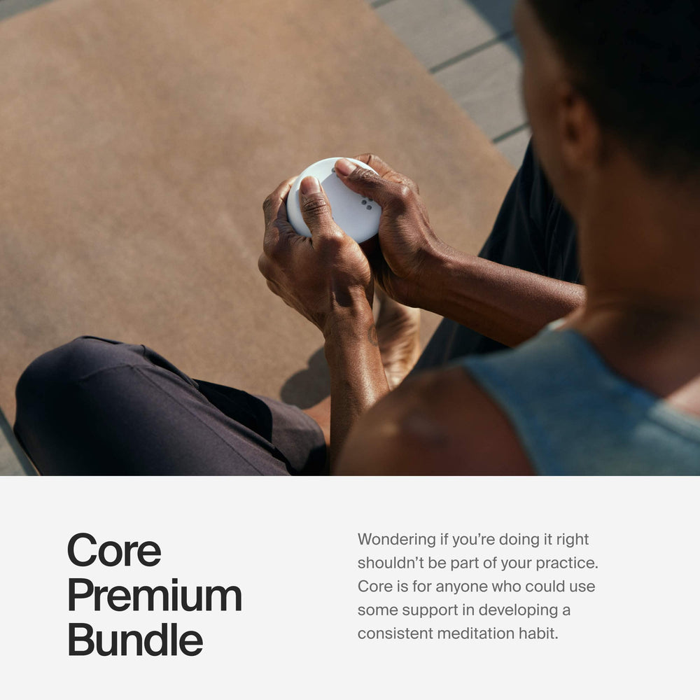 Core Meditation Trainer paired with app on phone for guided sessions.