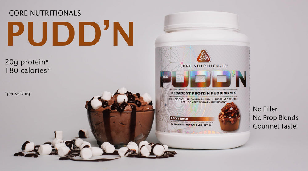 Core Nutritionals Pudd'n Rocky Road spoon lifting smooth pudding for a satisfying snack.