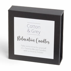 Close-up of Cotton & Grey beeswax texture highlighting a natural warm glow.