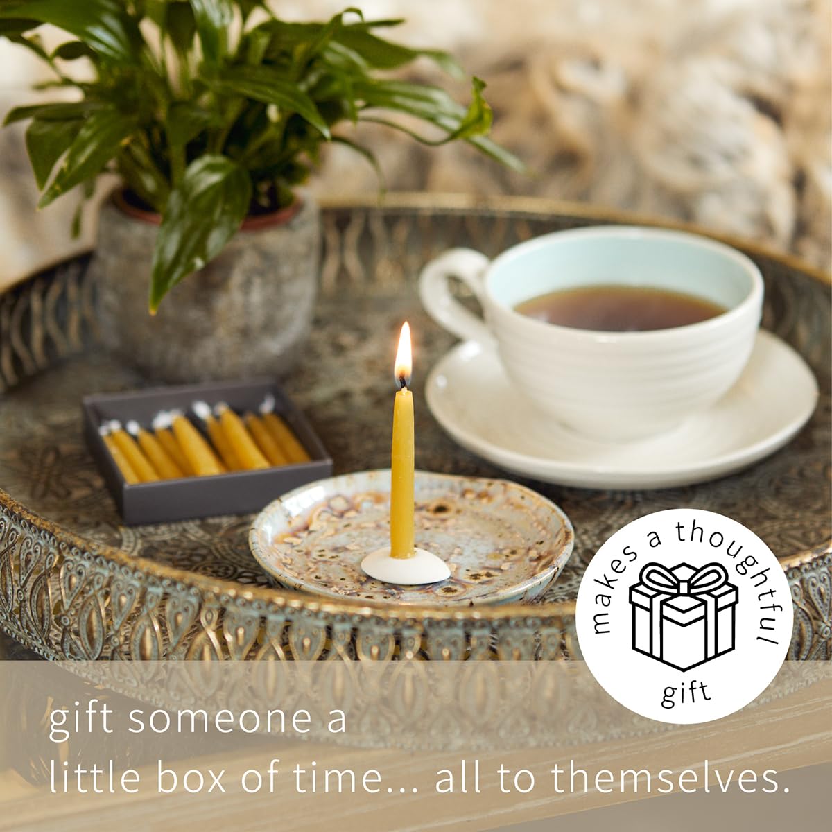Unlit to lit: Cotton & Grey candles create a cozy ambience.