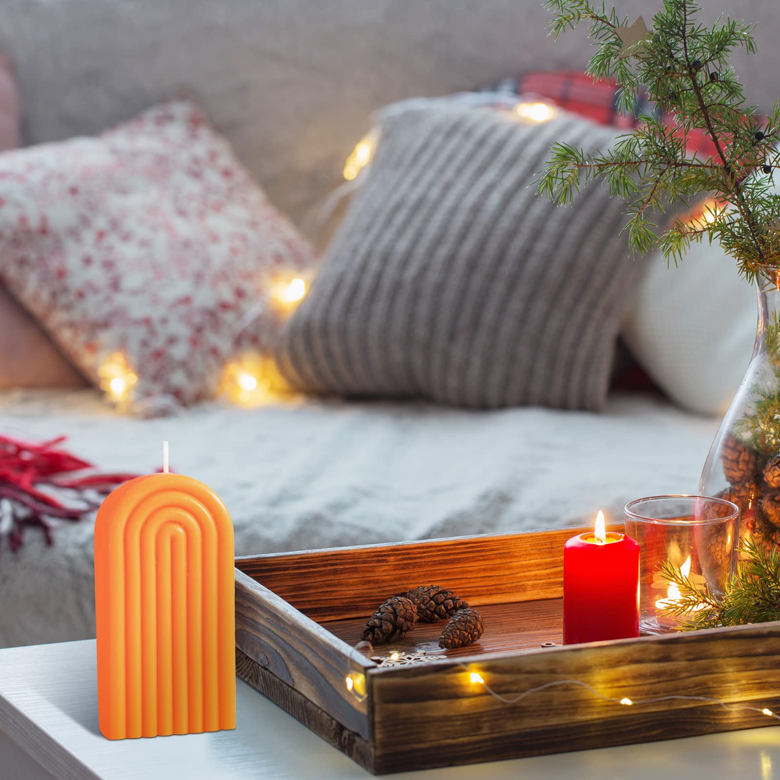 Decorative orange candle by Coume ideal for gifting and celebrations.