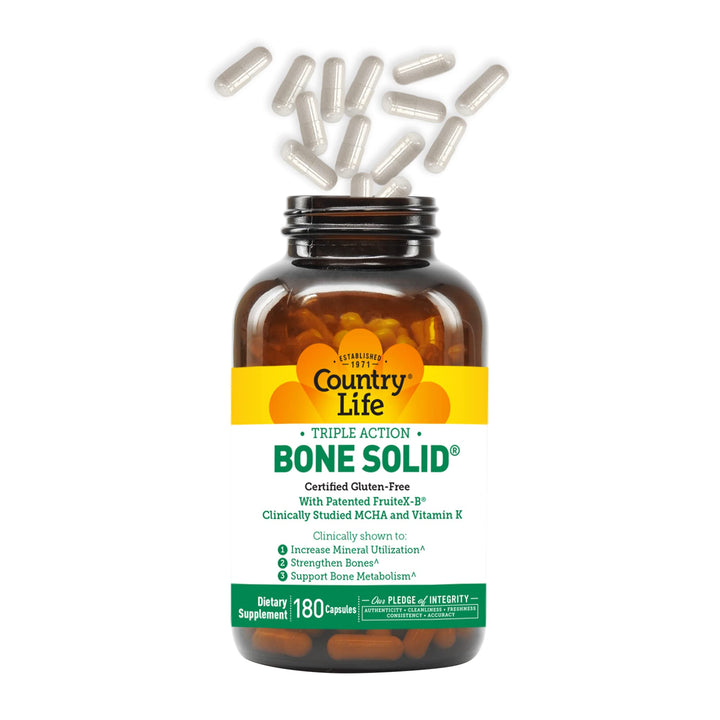 Country Life Bone Solid bottle on shelf signals daily bone health support.
