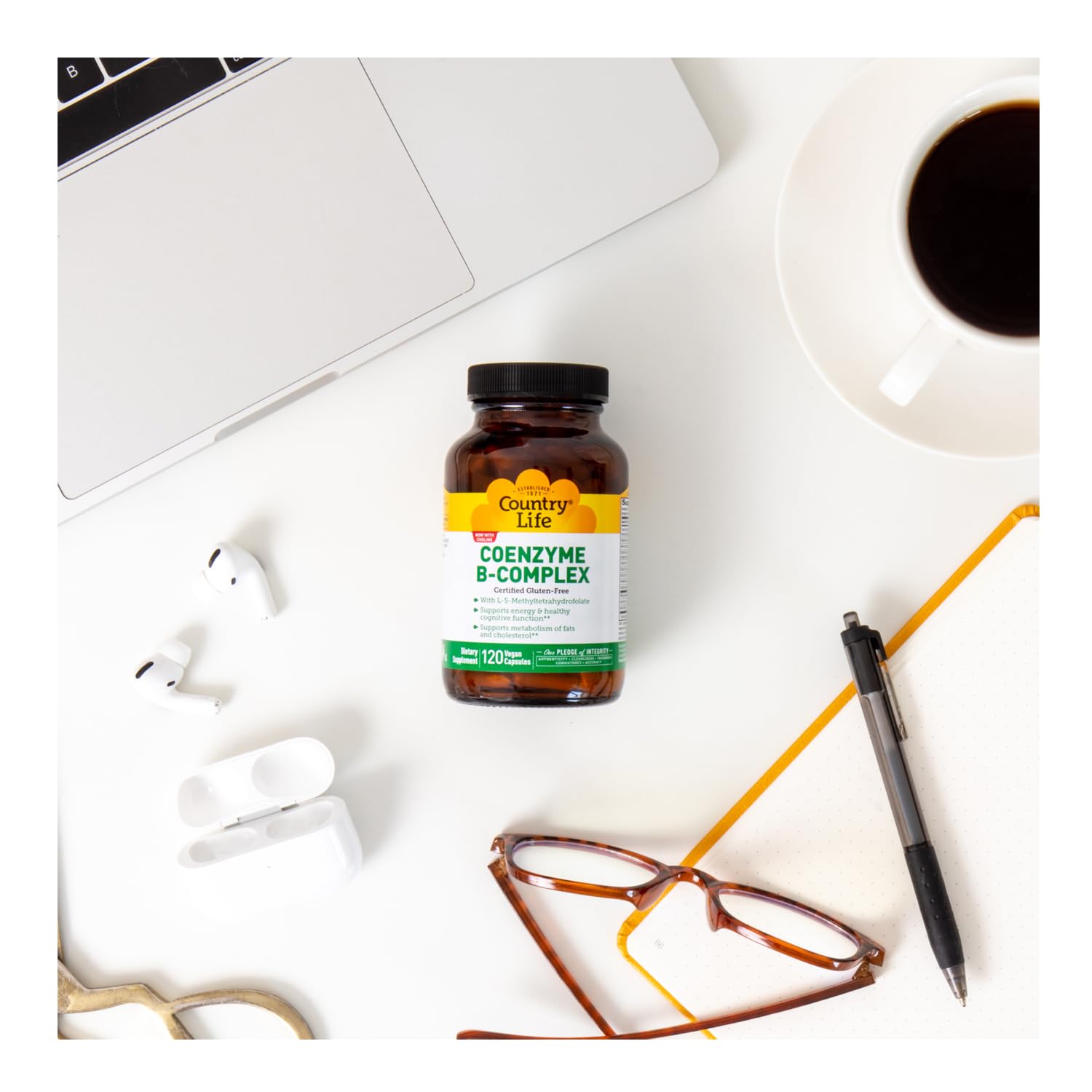 Country Life Coenzyme B-Complex beside a glass of water for quick daily support.