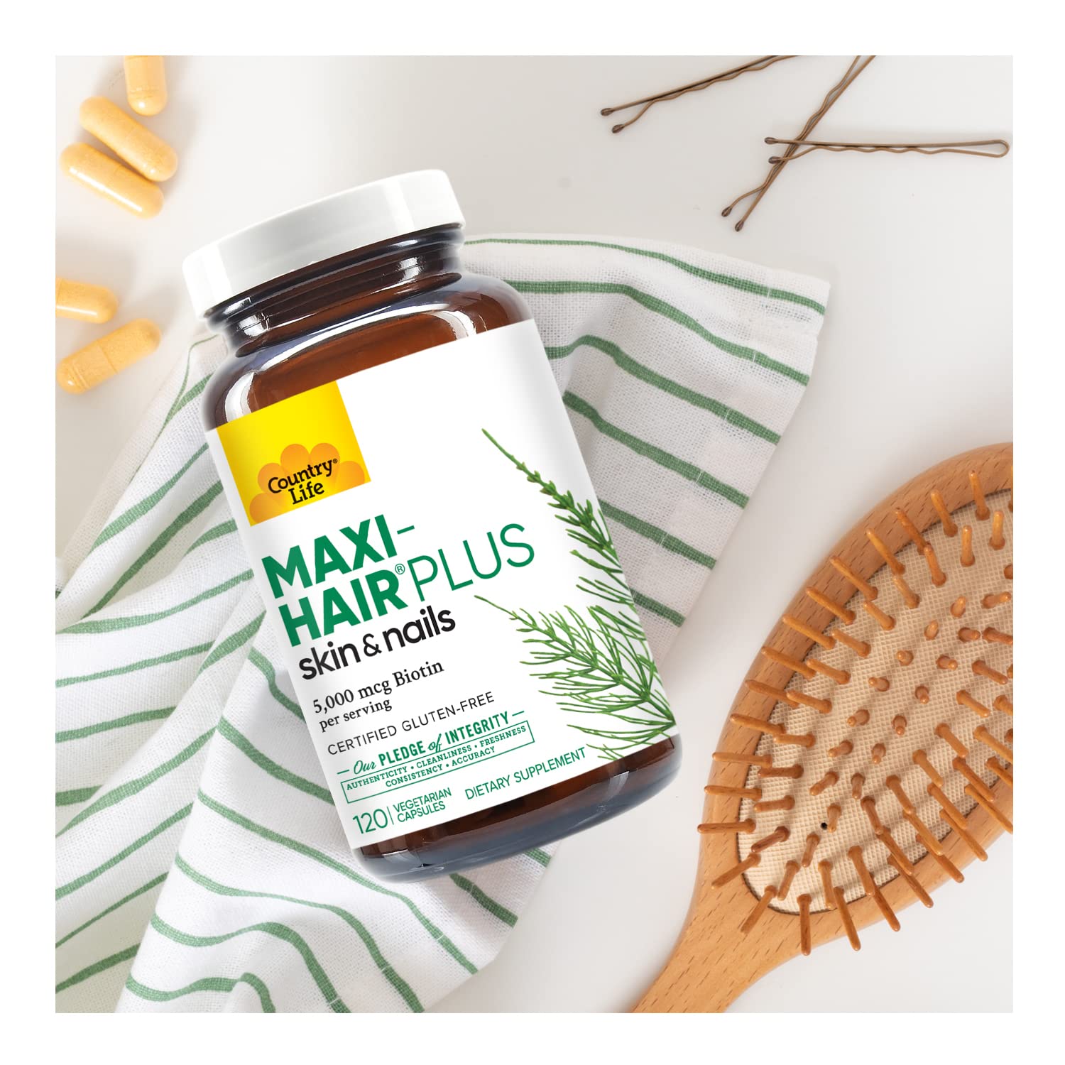 Country Life Maxi-Hair Plus Biotin bottle beside MSM illustration for a nutrient-rich formula