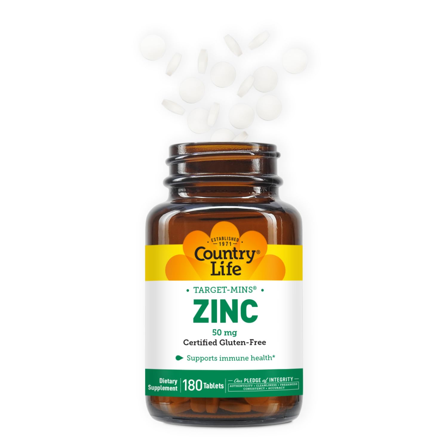 Hands holding a Country Life Target-Mins Zinc tablet for daily use