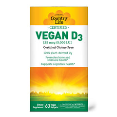 Country Life Vegan D3 5000 IU bottle on desk, convenient plant-based supplement.