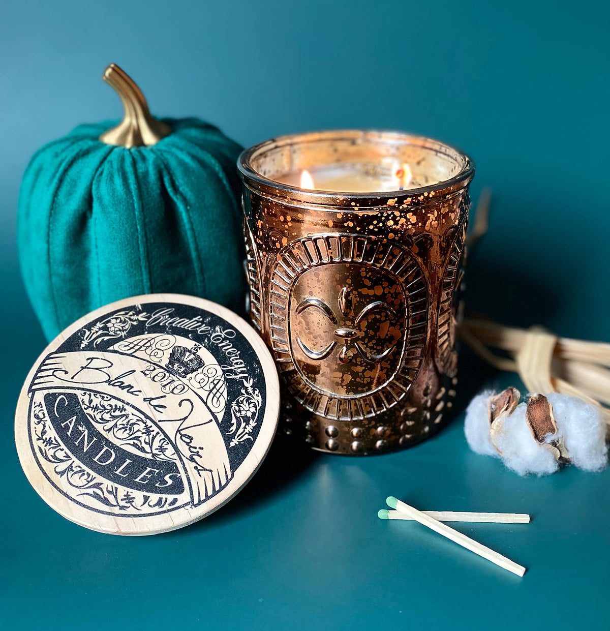 Creative Energy Candles lotion candle in Grande Champagne jar enhances ambiance while nourishing skin.
