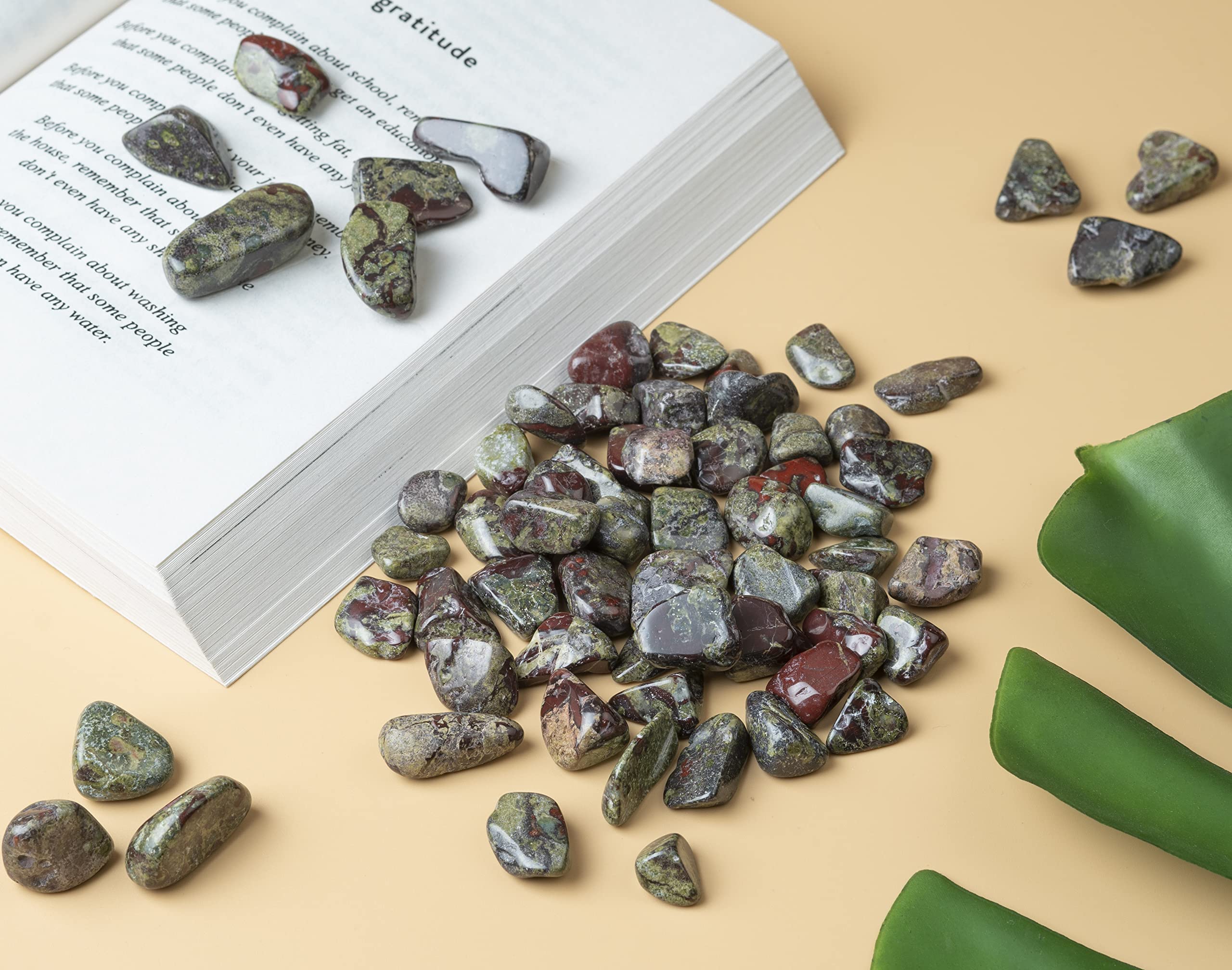 Crocon Dragon Bloodstone stones in a dish for home decor display