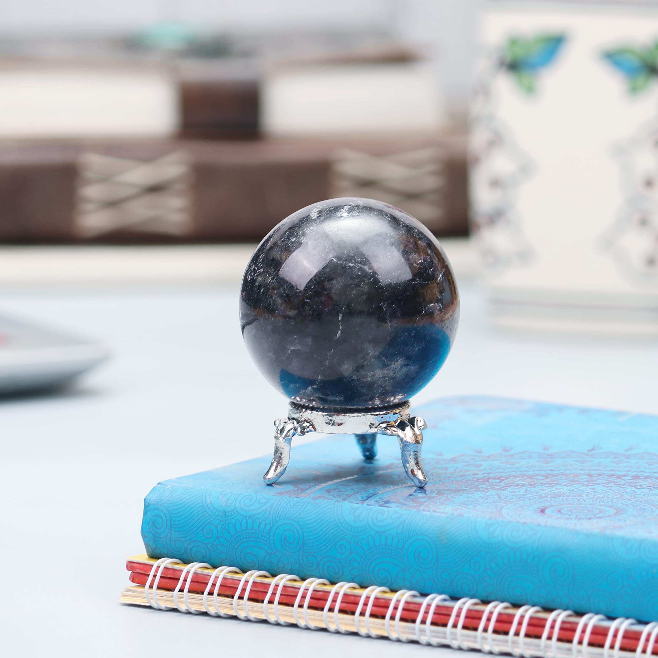 Crocon photography prop sphere with soft lighting for shoots.