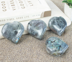 Crocon purple Labradorite heart crystal enhances desk decor with a soothing glow