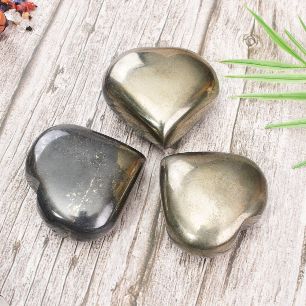 Crocon Golden Pyrite Heart close-up, polished and luminous for meditation.