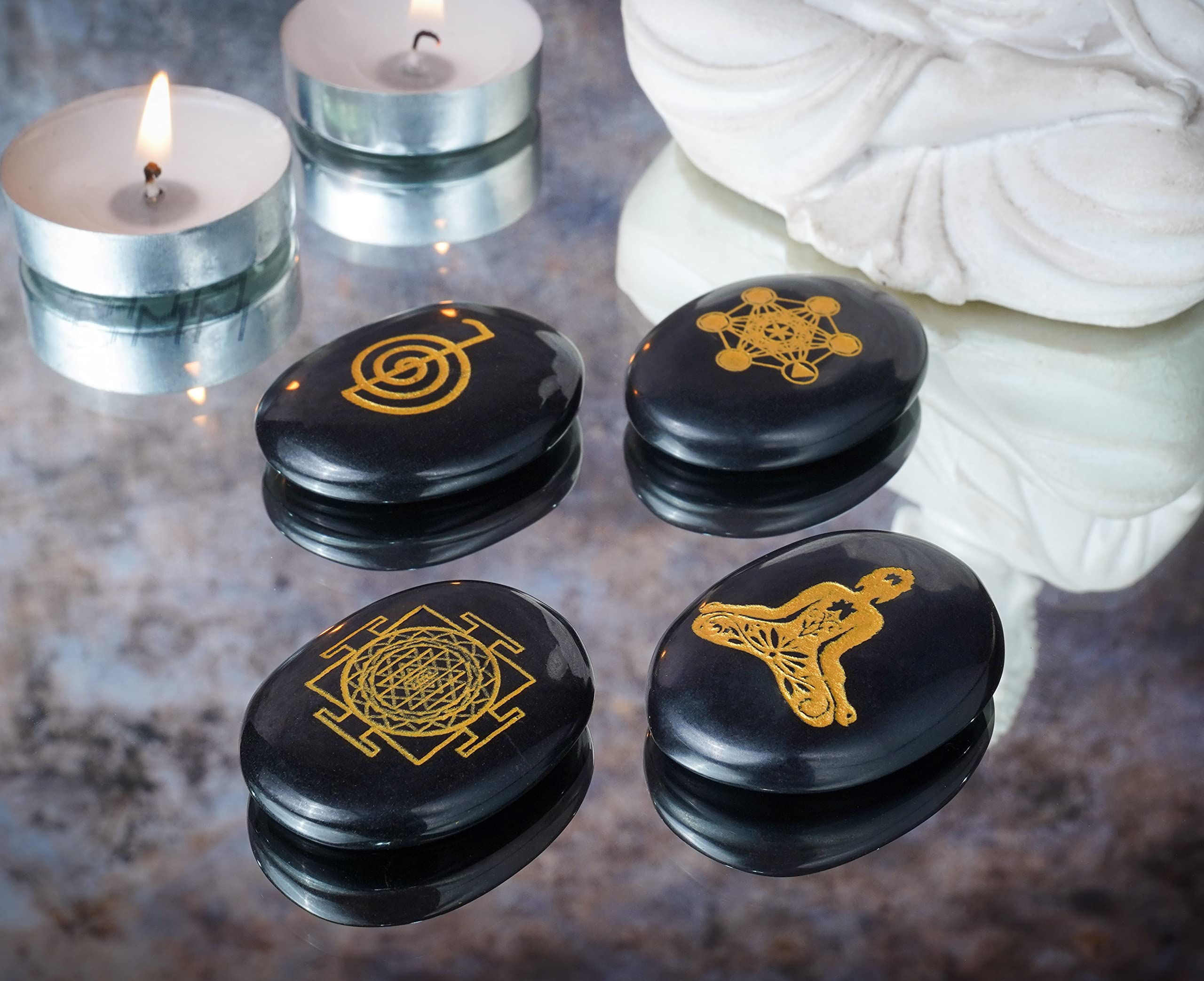 Crocon Reiki symbol palm stone engraved with chakra symbol for balance.