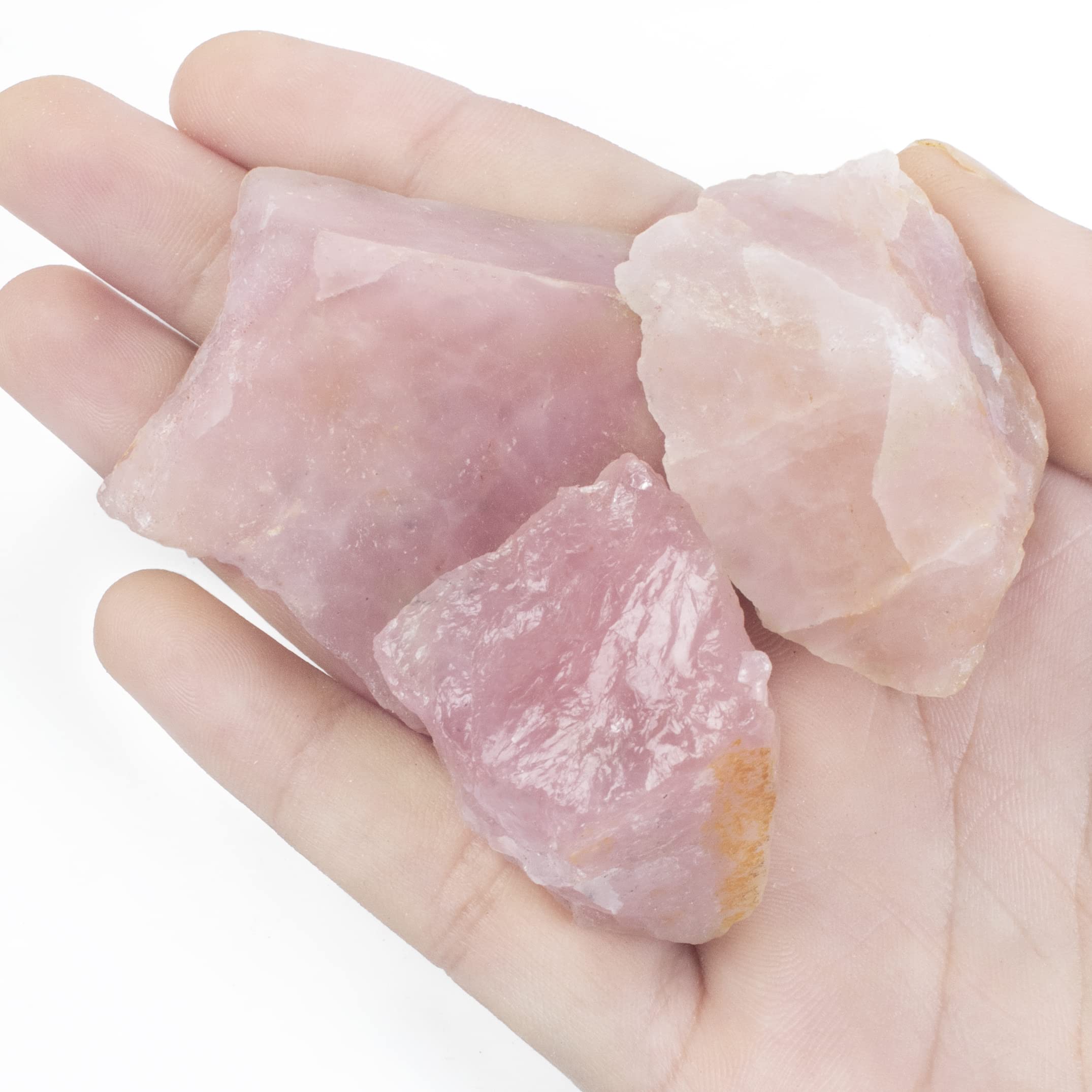 Crocon Rose Quartz rough stone closeup showing natural texture for meditation focus.