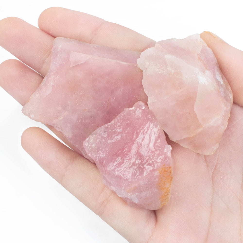 Crocon Rose Quartz rough stone closeup showing natural texture for meditation focus.