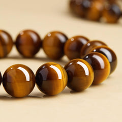 CrystalHouzz Tiger Eye Beads polished detail highlights natural variation and style.
