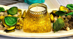 CRYSTALMIRACLE Citrine Orgonite tea light holder interior crystals visible for tranquil focus.
