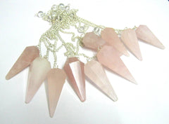 CRYSTALMIRACLE cone pendulum close-up highlighting polished facets for divination