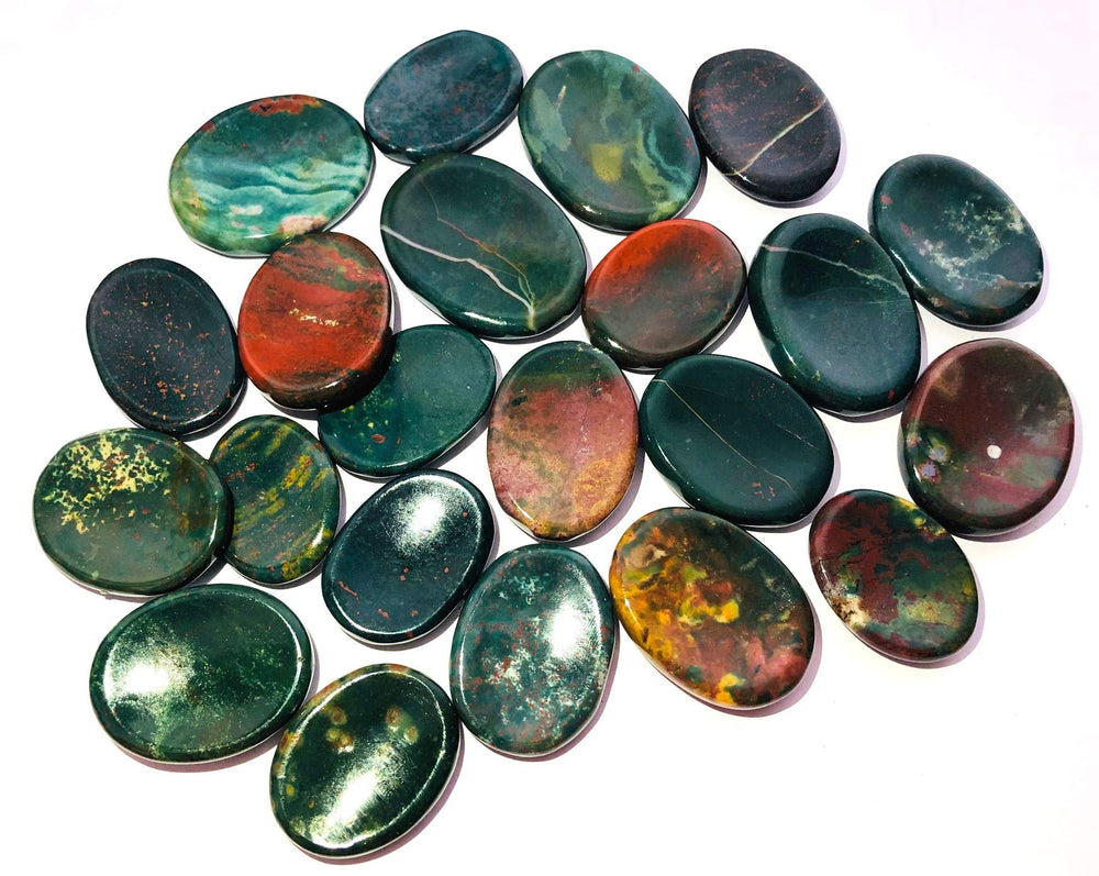 CRYSTALMIRACLE Energizing stone collection supports chakra balance.