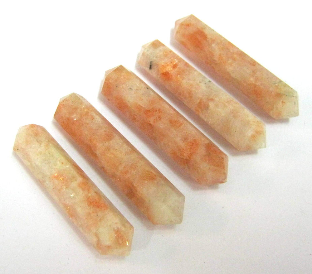 CRYSTALMIRACLE five sunstone double-terminated points for grounding and creative flow.