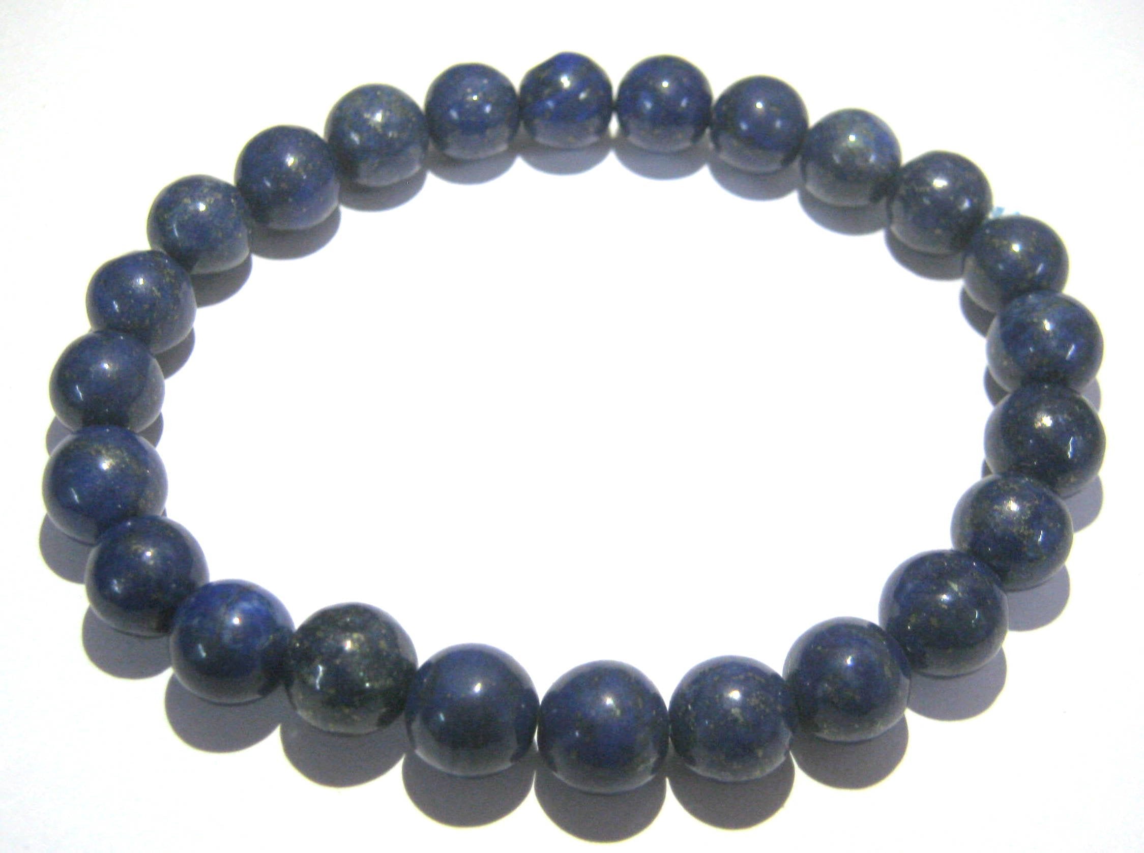 CRYSTALMIRACLE lapis lazuli jewelry close-up showing natural veining and protective energy.