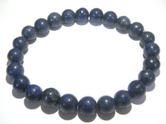 CRYSTALMIRACLE lapis lazuli jewelry close-up showing natural veining and protective energy.