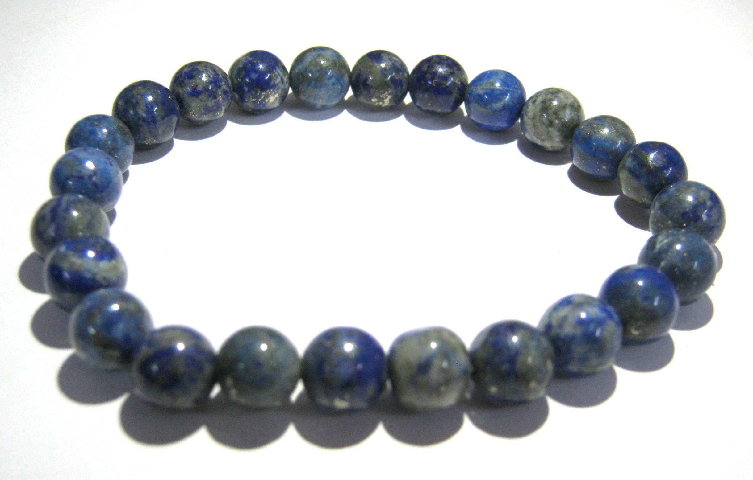CRYSTALMIRACLE lapis lazuli stretch bracelet on seven-inch wrist for daily confidence.